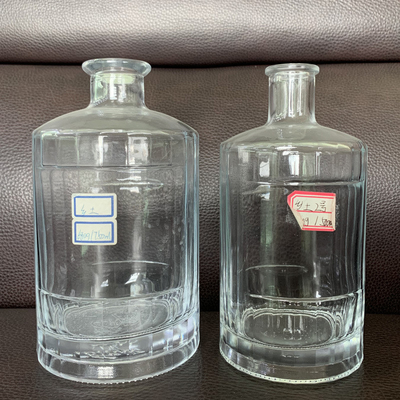 Custom 750ml Embossed Logo Wine Glass Bottle in Clear Color for Branded Whisky
