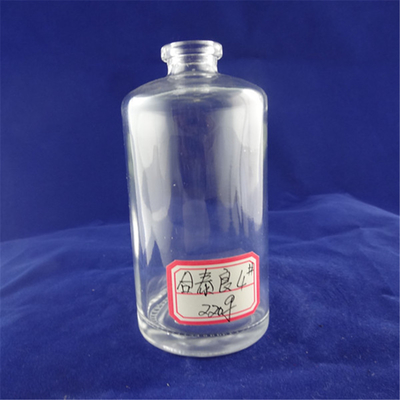 Free Sample 500 ml 750 ml Glass Round Liquor Bottle with Cork Sealing Type