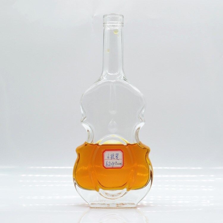 Big Good 700ml 750g Transparent Glass Packaging for Special Shape Violin Skull Bottle